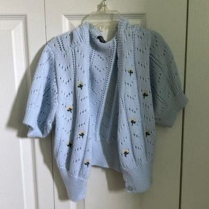 Cropped blue cable knit embroidered sweater